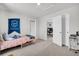 Bright bedroom featuring a playful decor, a cozy bed, and ample closet space at 435 Woodgate Way, Summerville, SC 29485