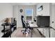 Bright home office features a gaming setup with a comfortable chair and a modern desk at 435 Woodgate Way, Summerville, SC 29485