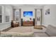 Bright living room showcasing a modern entertainment center, plush seating, and streaming tv at 435 Woodgate Way, Summerville, SC 29485