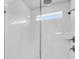 Modern shower with white subway tile, a glass enclosure, and sleek chrome fixtures at 435 Woodgate Way, Summerville, SC 29485