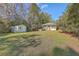 Quaint cottage with a storage shed sitting on a large, well-maintained lot at 4401 Prices Bridge Ln, Walterboro, SC 29488