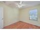 Bedroom features hardwood floors, neutral walls, and a ceiling fan at 4401 Prices Bridge Ln, Walterboro, SC 29488
