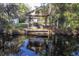 Picturesque dock and screened porch sitting on a peaceful pond at 4401 Prices Bridge Ln, Walterboro, SC 29488