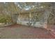 Charming home nestled among mature trees featuring a covered porch with white railings at 4401 Prices Bridge Ln, Walterboro, SC 29488