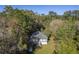 Charming single-story home surrounded by mature trees, creating a peaceful and private setting at 4401 Prices Bridge Ln, Walterboro, SC 29488