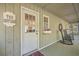 Charming front porch featuring a decorative sign, wreath, and comfortable rocking chairs at 4401 Prices Bridge Ln, Walterboro, SC 29488