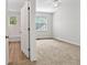 Bright bedroom features a ceiling fan, carpeted floor, and windows for lots of natural light at 4591 Great Oak Dr, North Charleston, SC 29418
