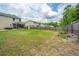 Expansive backyard featuring a shed, fenced perimeter, and mature trees at 5088 Thornton Dr, Summerville, SC 29485