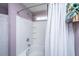 A clean, well-maintained bathroom featuring a bathtub and shower with white tile surround at 5088 Thornton Dr, Summerville, SC 29485