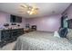 Large bedroom with ceiling fan, television, and good natural light at 5088 Thornton Dr, Summerville, SC 29485