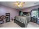 Spacious bedroom with ceiling fan, natural light, and room for furniture at 5088 Thornton Dr, Summerville, SC 29485