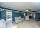 Spacious living room featuring neutral walls, ample seating, and a bright open space at 5088 Thornton Dr, Summerville, SC 29485