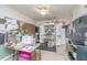 Well-organized home office with chalkboard wall, cabinets, and ample workspace at 5088 Thornton Dr, Summerville, SC 29485