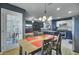 Inviting dining area with table for four, direct access to the kitchen and living room at 522 Tayrn Dr, Wando, SC 29492