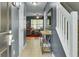 Welcoming foyer boasts tile floors, a decorative table, and access to the staircase and living room at 522 Tayrn Dr, Wando, SC 29492