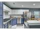 Well-equipped kitchen with stainless steel appliances and ample cabinet space at 522 Tayrn Dr, Wando, SC 29492