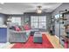Comfortable living room with hardwood floors, natural light, and access to the dining area at 522 Tayrn Dr, Wando, SC 29492
