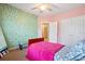 Vibrant bedroom with a bed, closet and stylish wall accents at 5258 Mulholland Dr, Summerville, SC 29485