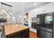 Bright kitchen with a large island, stainless steel appliances, and recessed lighting at 5258 Mulholland Dr, Summerville, SC 29485