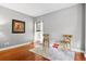 Cozy office with hardwood floors, ample natural light, and simple decor, perfect for a productive workspace at 5258 Mulholland Dr, Summerville, SC 29485