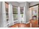 Bright office space with ample natural light, hardwood floors, and modern finishes at 5258 Mulholland Dr, Summerville, SC 29485