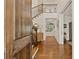 Inviting entryway features hardwood floors, staircase, and modern decor, creating a warm and stylish welcome at 554 Parrot Point Dr, Charleston, SC 29412
