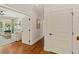 Bright hallway with hardwood floors leading into living area at 554 Parrot Point Dr, Charleston, SC 29412