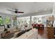 Open floor plan connecting the living room to kitchen with counter seating at 554 Parrot Point Dr, Charleston, SC 29412