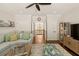 Cozy living room with comfortable seating and a view of the landing upstairs at 554 Parrot Point Dr, Charleston, SC 29412
