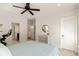 Bright main bedroom with a ceiling fan, soothing colors, and comfortable furniture for relaxation at 554 Parrot Point Dr, Charleston, SC 29412