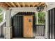 Outdoor bathroom with barn door, providing convenience and privacy for pool guests at 554 Parrot Point Dr, Charleston, SC 29412