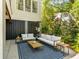 Inviting covered outdoor patio with comfortable seating area, ideal for relaxing and entertaining in style at 554 Parrot Point Dr, Charleston, SC 29412