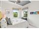 Fun bedroom design with a themed ceiling, decorative lighting, and charming space-themed accents at 566 Scholar Way, Summerville, SC 29486
