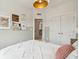 Charming bedroom features wall art, double closets, and a stylish light fixture at 566 Scholar Way, Summerville, SC 29486