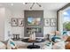 Stylish living room with fireplace, modern lighting, and contemporary decor at 566 Scholar Way, Summerville, SC 29486