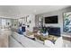 Spacious living area with modern decor, open to the kitchen and dining space at 566 Scholar Way, Summerville, SC 29486