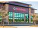 Exterior of Harris Teeter grocery store with glass windows and manicured landscaping at 566 Scholar Way, Summerville, SC 29486