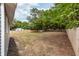 Expansive backyard offering ample space with a wooden fence and view of the home at 6146 Chisolm Rd, Johns Island, SC 29455