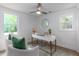 Bright home office with neutral colors, a ceiling fan, and natural light at 6146 Chisolm Rd, Johns Island, SC 29455