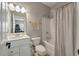 Well-maintained bathroom featuring a vanity, toilet, and shower-tub combination with a curtain at 626 Windermere Blvd # 4D, Charleston, SC 29407