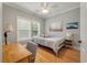 Comfortable bedroom with a light color scheme and wood floors at 626 Windermere Blvd # 4D, Charleston, SC 29407