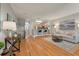 Living room with hardwood floors and access to kitchen at 626 Windermere Blvd # 4D, Charleston, SC 29407