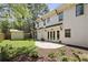 Expansive backyard featuring a lush lawn, a patio, mature trees, and a convenient storage shed at 755 Adluh St, Mount Pleasant, SC 29464
