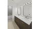 This bathroom features a double sink vanity with a marble countertop and modern fixtures with a patterned tile surround at 755 Adluh St, Mount Pleasant, SC 29464