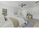 Bedroom featuring hardwood floors, neutral-toned furniture, ceiling fan, and natural light at 755 Adluh St, Mount Pleasant, SC 29464