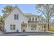 Inviting two-story home with white siding, a covered front porch, and craftsman-style details at 755 Adluh St, Mount Pleasant, SC 29464