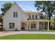 Charming home with a manicured lawn, covered porch, and inviting front entrance exuding curb appeal at 755 Adluh St, Mount Pleasant, SC 29464