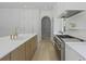 Well-appointed kitchen featuring modern appliances, ample storage, and an adjacent pantry area at 755 Adluh St, Mount Pleasant, SC 29464