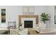 Cozy living room featuring a modern fireplace, neutral decor, and ample natural light at 755 Adluh St, Mount Pleasant, SC 29464
