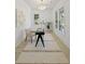 Bright office space with modern black desk, decorative lighting, and area rug at 755 Adluh St, Mount Pleasant, SC 29464